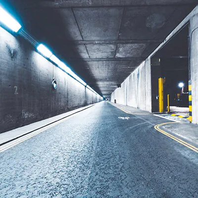 Car park entrance illuminated with floodlights